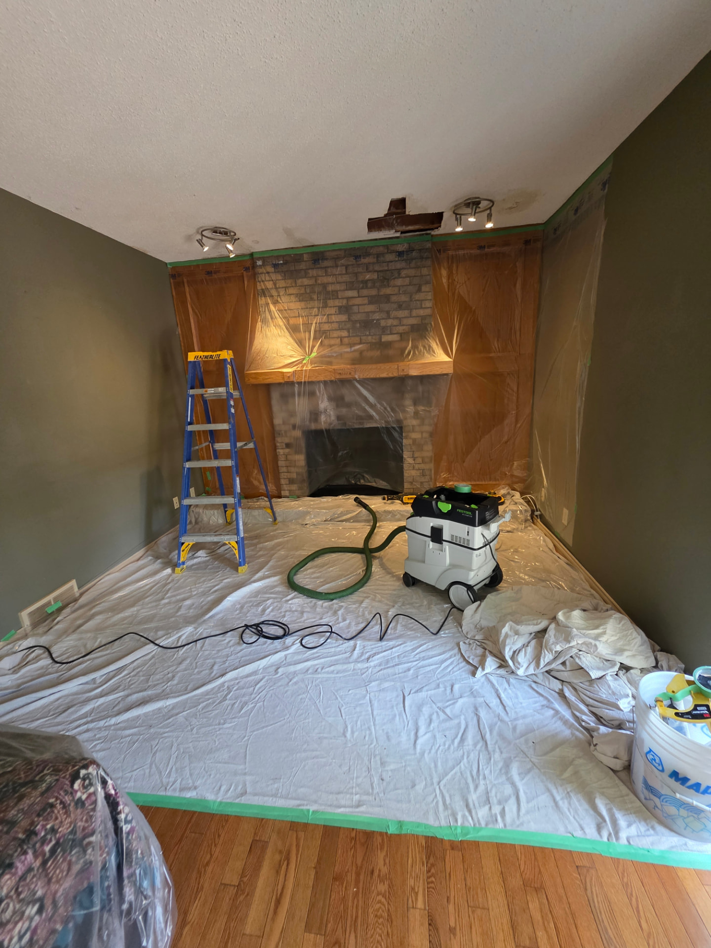 Before: living room ceiling repair and popcorn texture removal